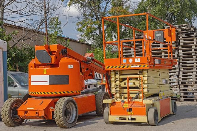 busy warehouse with forklifts in motion in Alpine